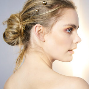 Kela gold ball strand styled